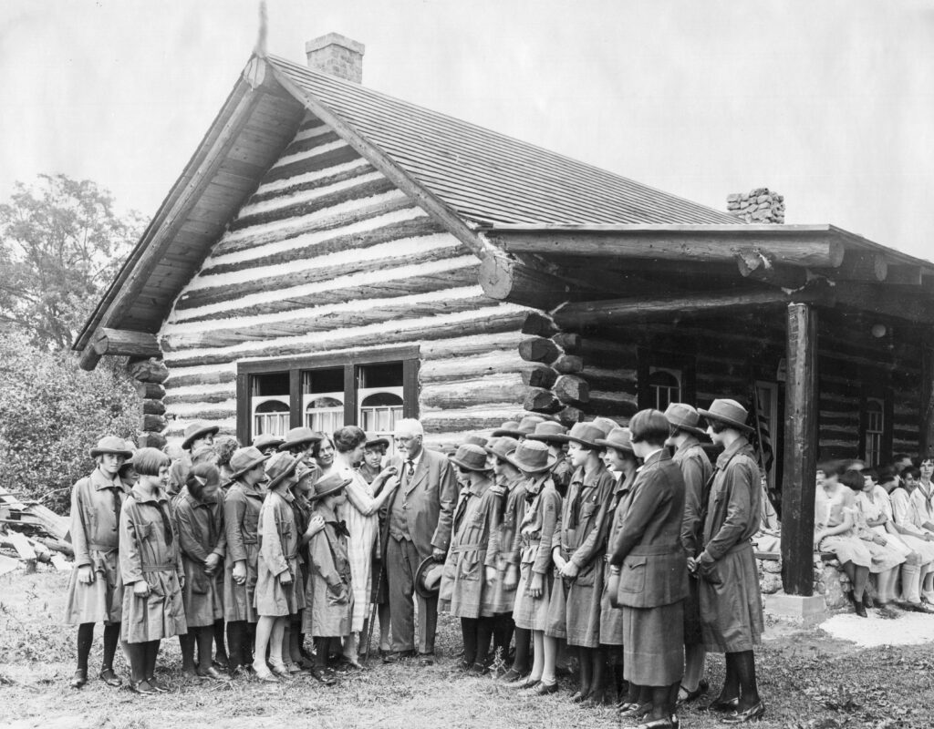 John Manning Wells receives Girl Scout badge award at Cabin in Maple Grove